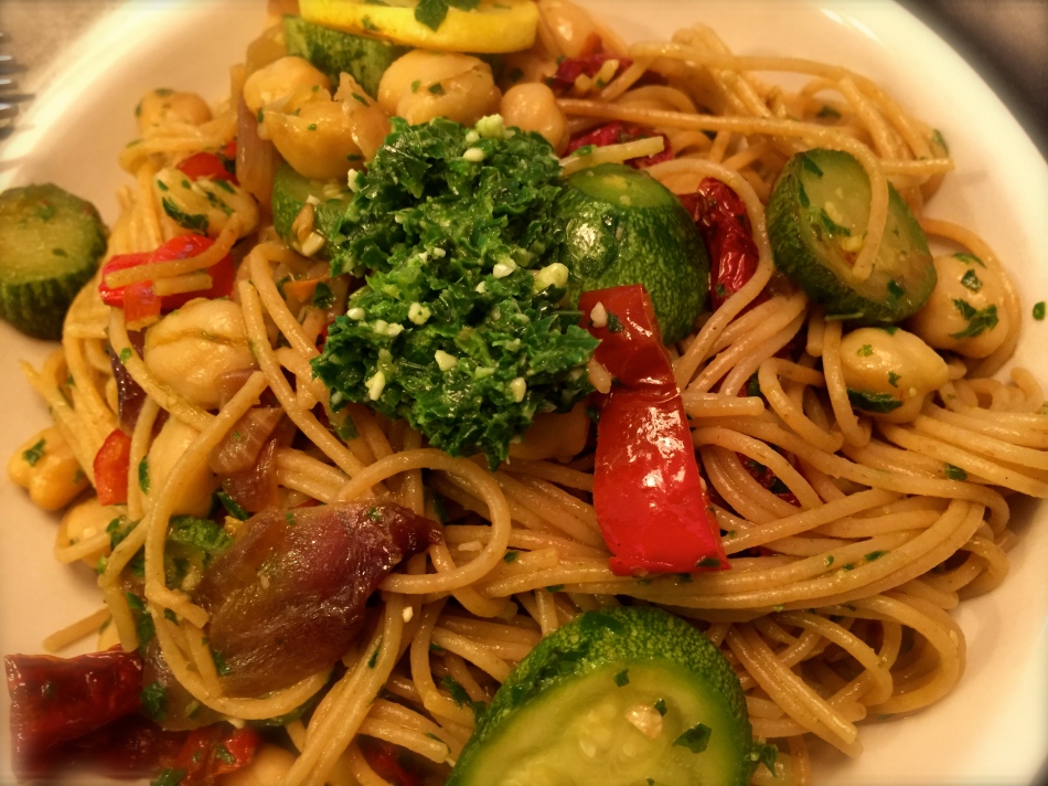 Spaghetti with homemade pesto and marinated dehydrated tomatoes!